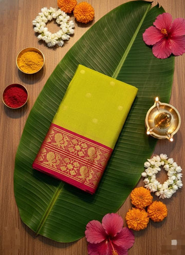 Vasanta Rani – Parrot Green Aura Silk Saree with Royal Pink Zari Border