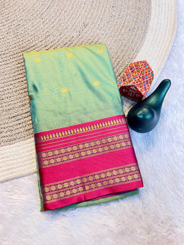Sea Green Aura Silk Saree with Rani Pink Zari Border & Blouse