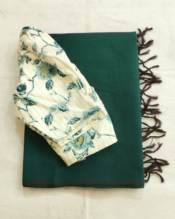 Dark Green Cotton Saree With A Cream-colored Blouse Featuring A Floral Print