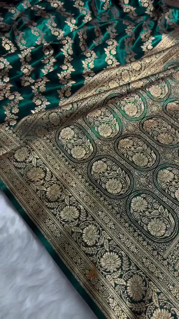 Close-up of a green and gold patterned fabric